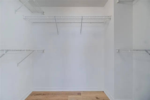 a view of a room with racks on the wall