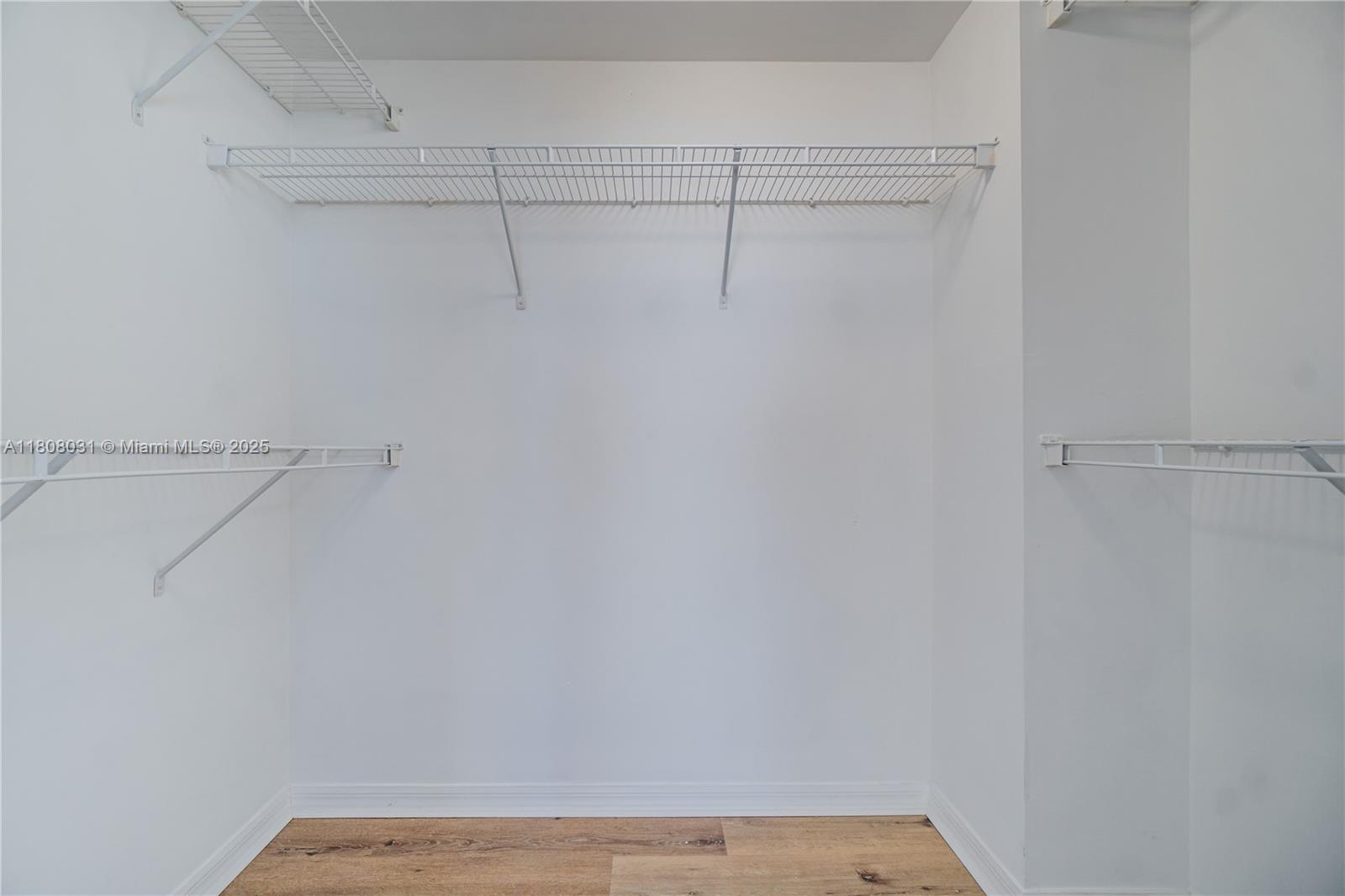 2665 Southwest 37th Avenue, Unit 906 Miami, FL 33133 - Photo 20 of 35 a view of a room with racks on the wall