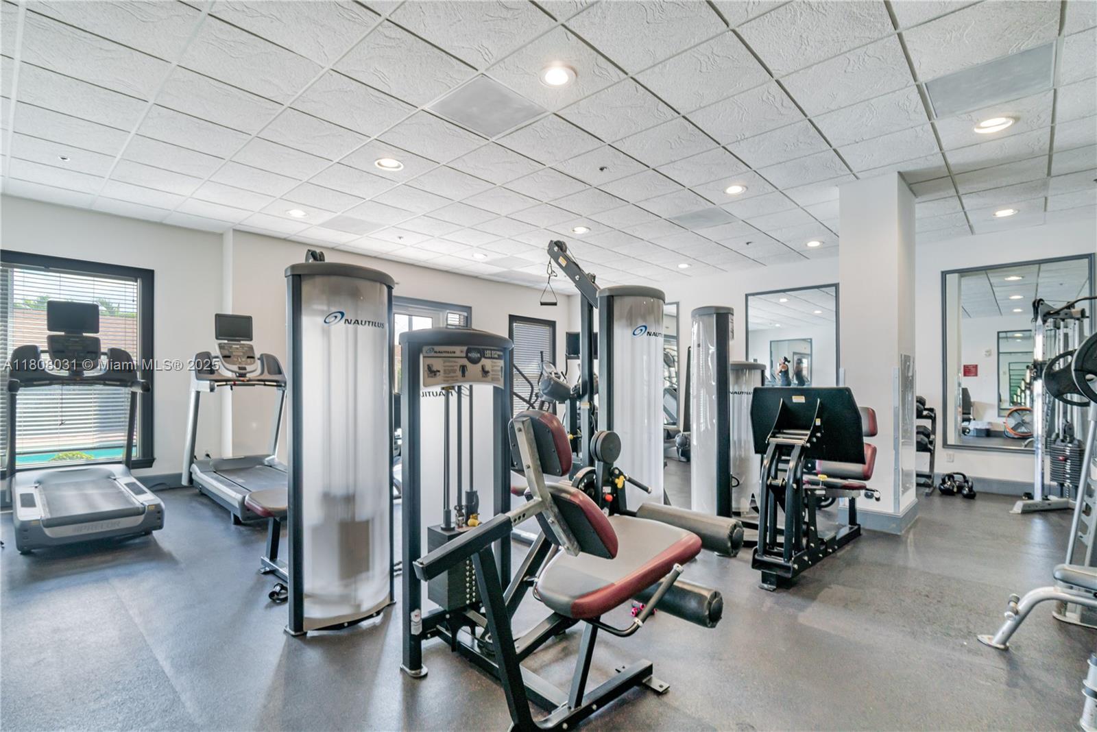 2665 Southwest 37th Avenue, Unit 906 Miami, FL 33133 - Photo 23 of 35 a view of a room with gym equipment