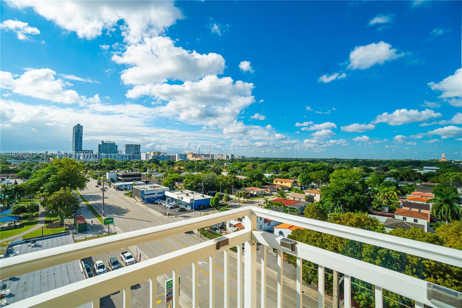 2665 Southwest 37th Avenue, Unit 906 Miami, FL 33133 - Photo 24 of 35 a view of a city from a balcony