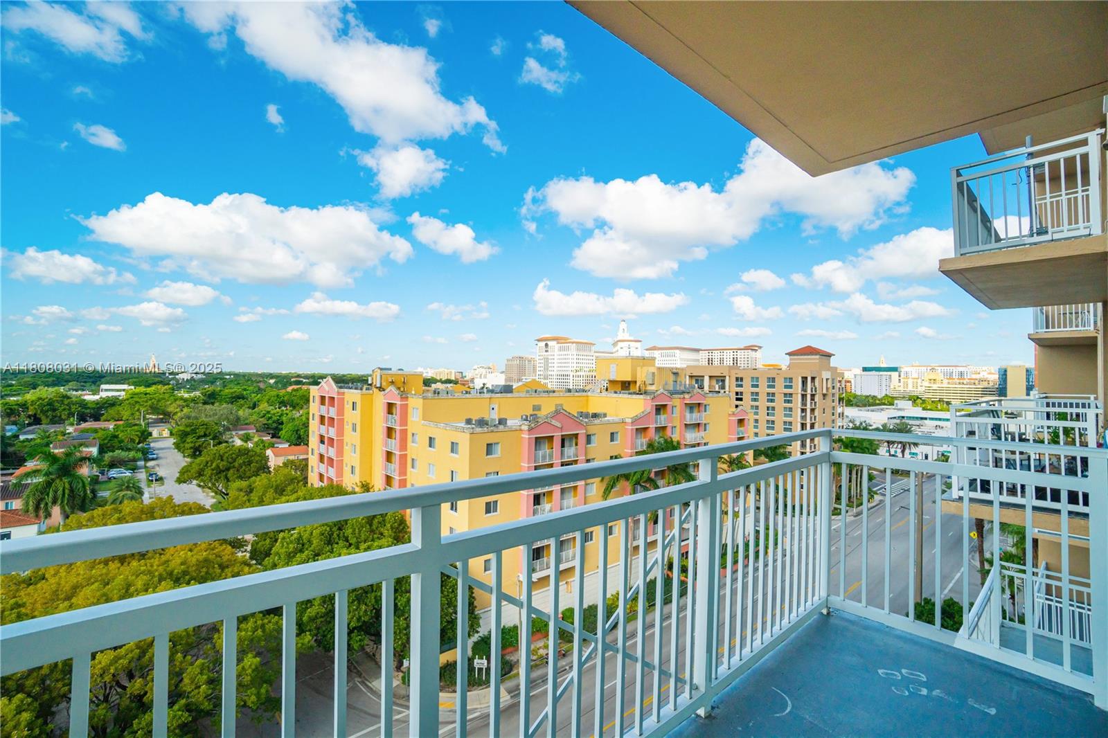 2665 Southwest 37th Avenue, Unit 906 Miami, FL 33133 - Photo 28 of 35 a view of a city from a balcony