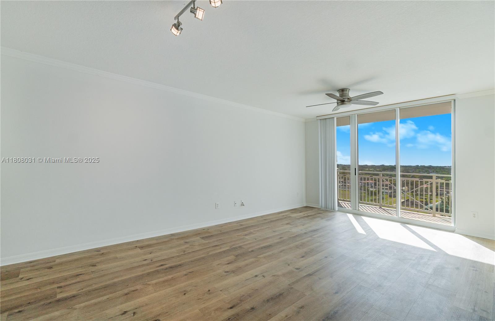 2665 Southwest 37th Avenue, Unit 906 Miami, FL 33133 - Photo 10 of 35 a view of an empty room with a window