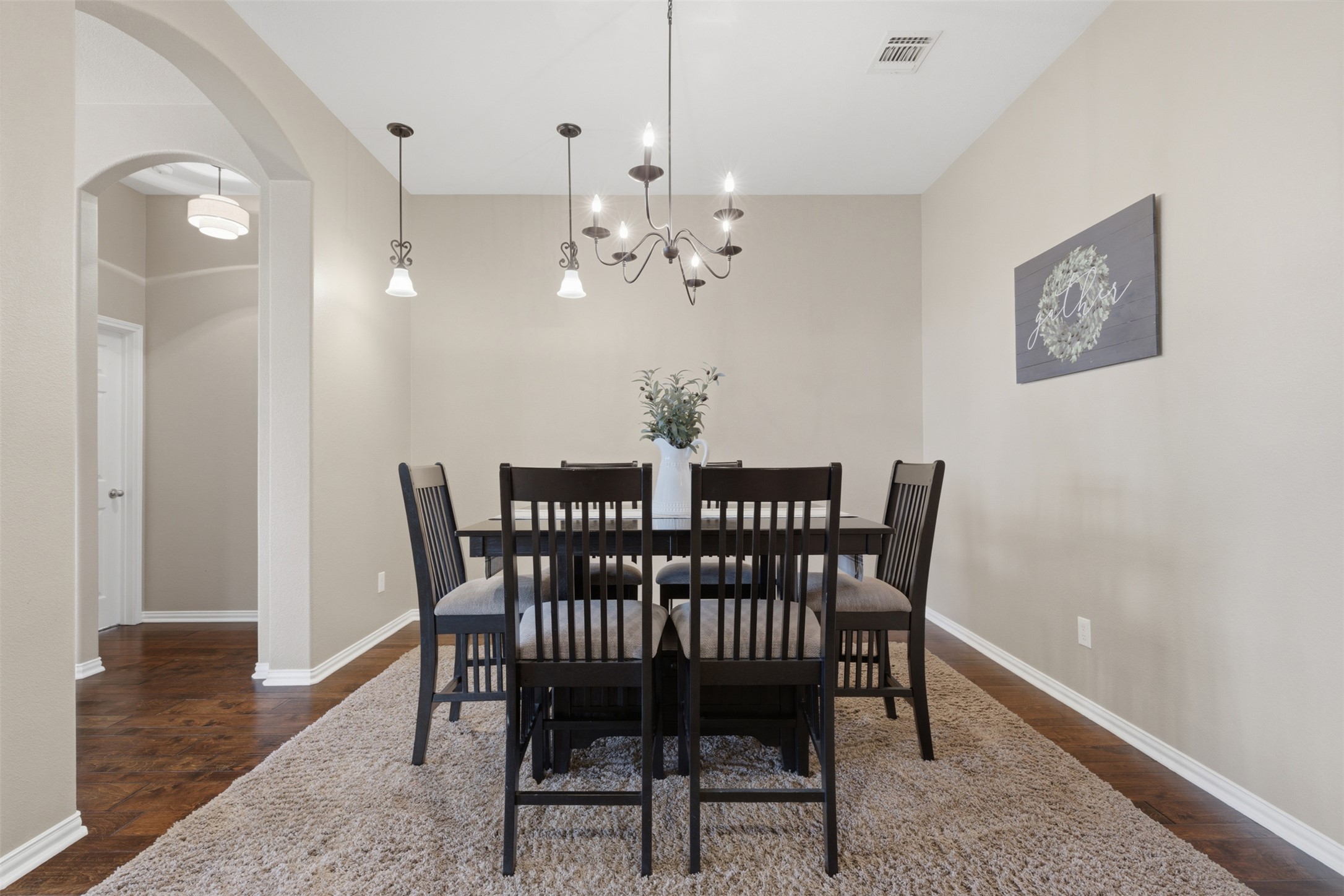 2568 Santa Barbara Loop Round Rock, TX 78665 - Photo 5 of 34 a view of a dining room with furniture and chandelier