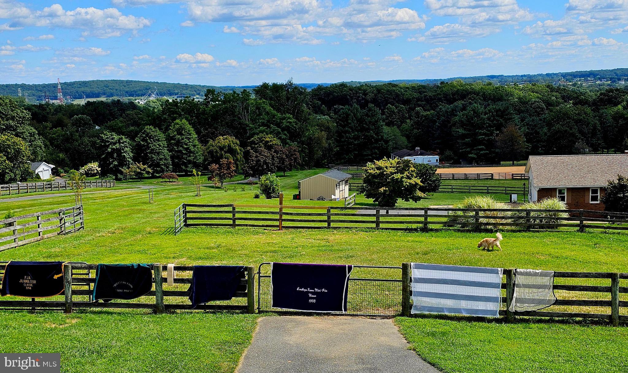 3054 Whiteford Road Whiteford, MD 21160 - Photo 5 of 8 an aerial view of a golf course with a big yard