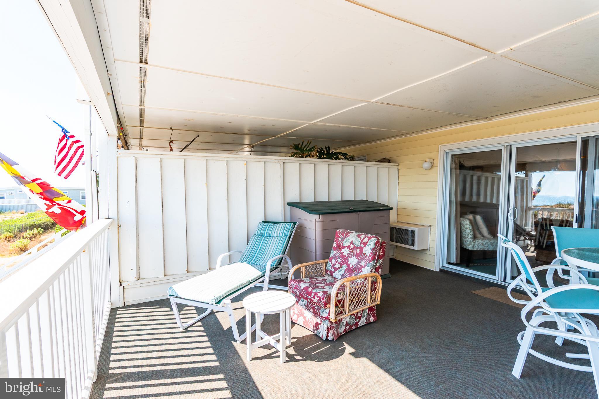 7601 Atlantic Avenue, Unit 3 Ocean City, MD 21842 - Photo 18 of 52 a bedroom with furniture and a baby crib