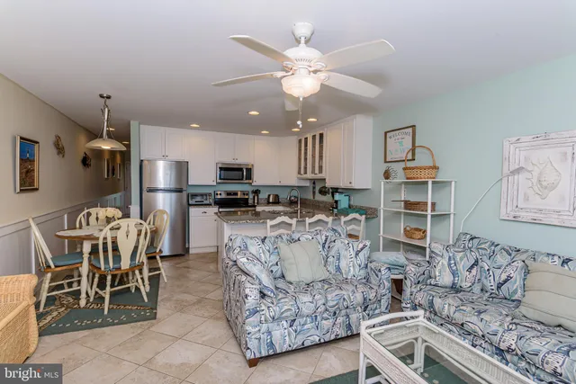 a kitchen with granite countertop cabinets and stainless steel appliances