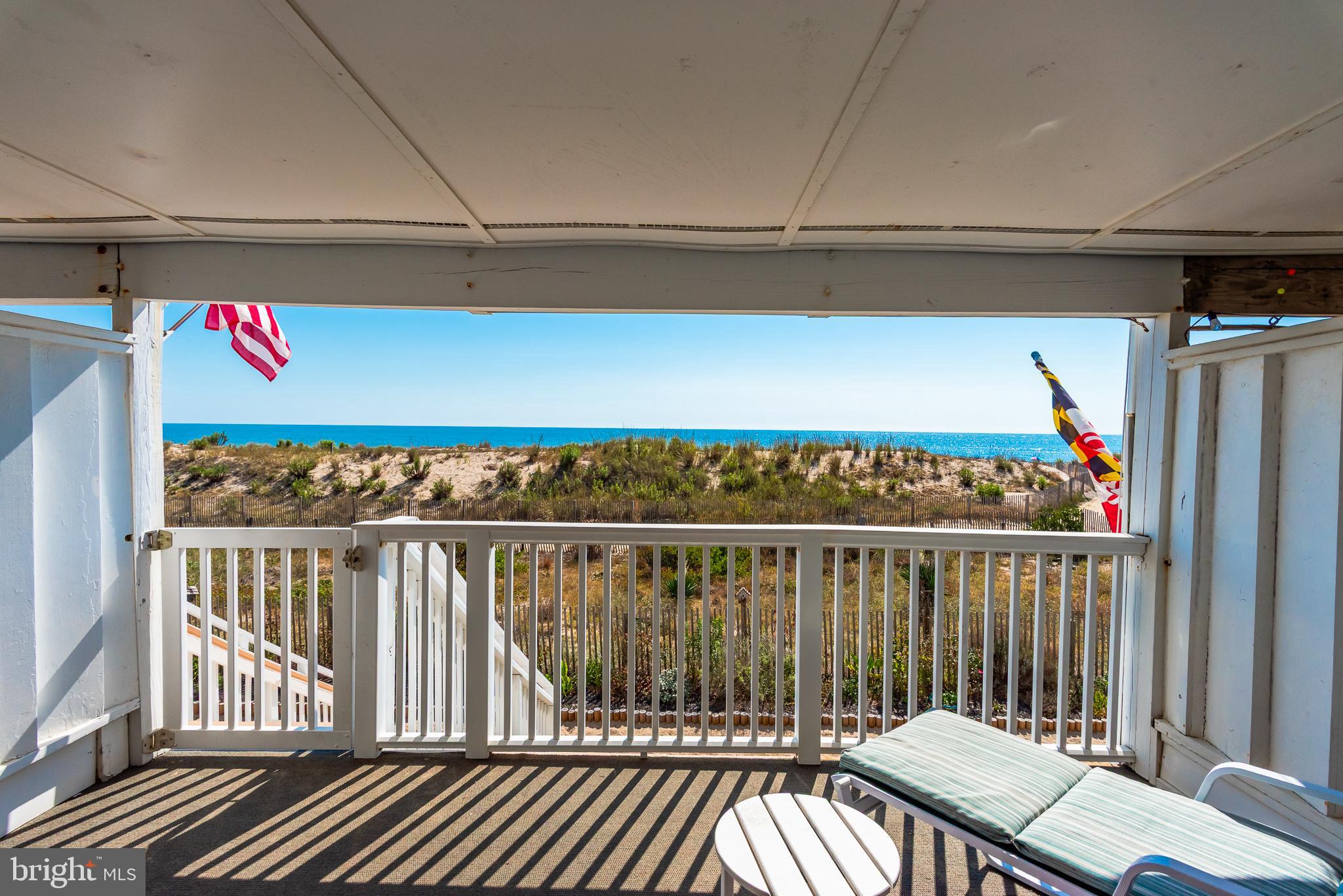 7601 Atlantic Avenue, Unit 3 Ocean City, MD 21842 - Photo 5 of 52 a view of a balcony with wooden floor
