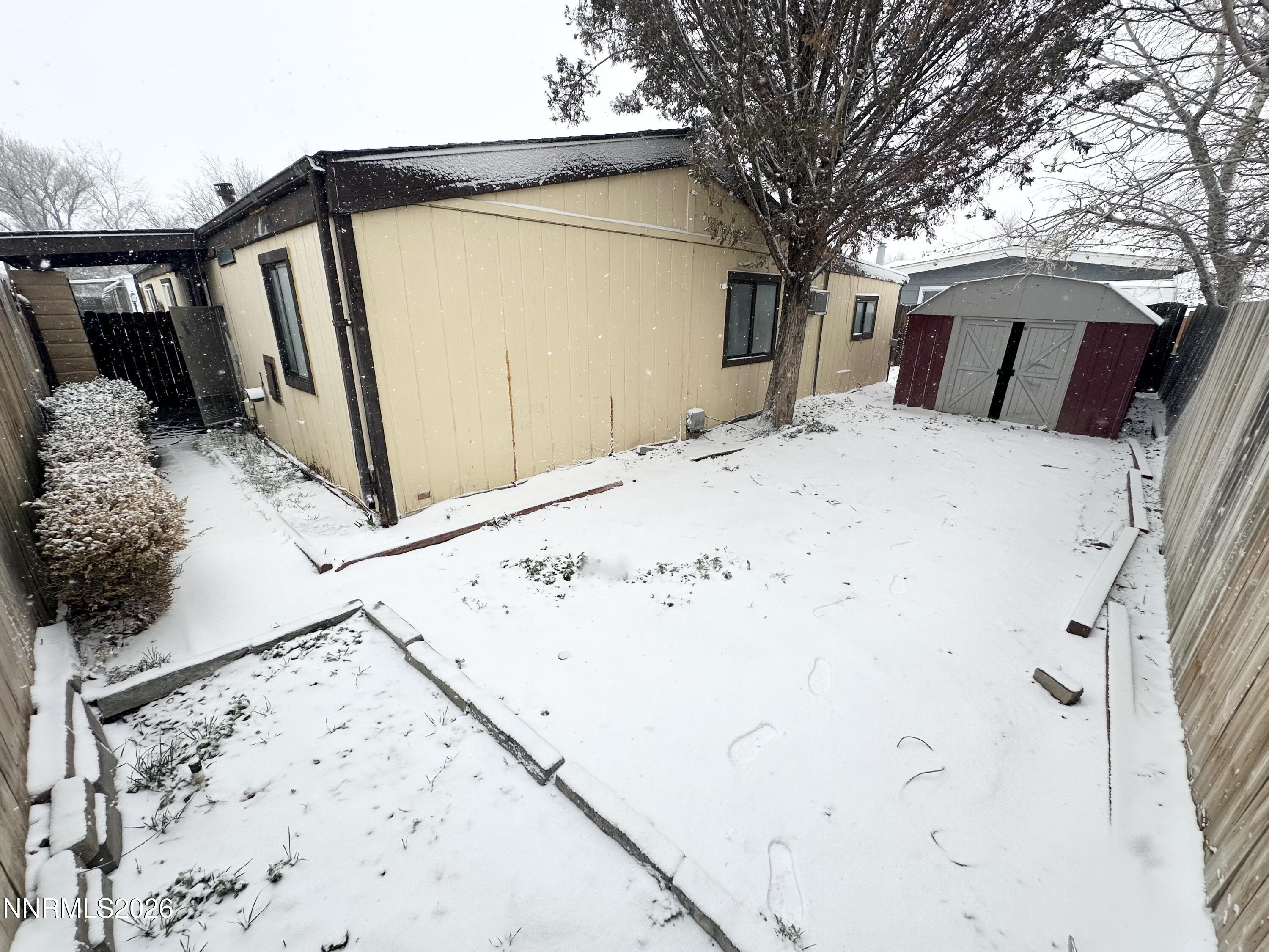 370 Randon Court Fernley, NV 89408 - Photo 15 of 15 a view of a house with a snow in the yard