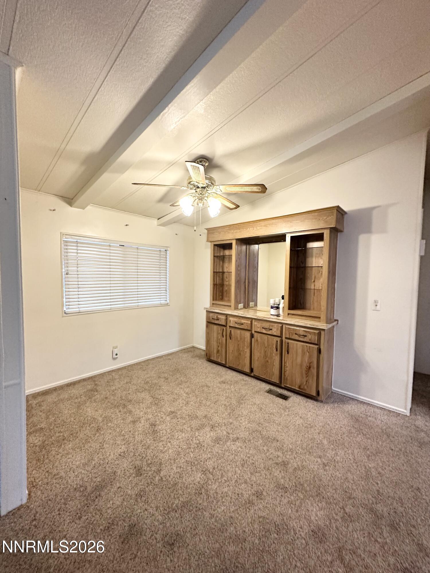 370 Randon Court Fernley, NV 89408 - Photo 4 of 15 a view of a livingroom with kitchen