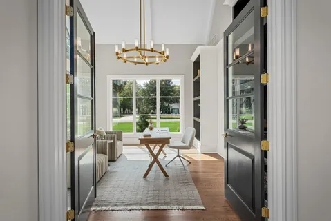 a view of a livingroom with furniture and window