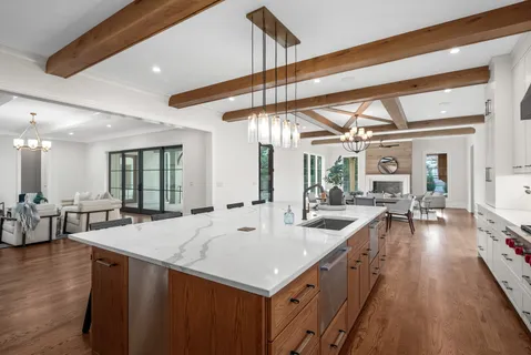 a view of a hallway with a window