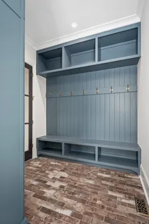 a bathroom with a shower sink and mirror
