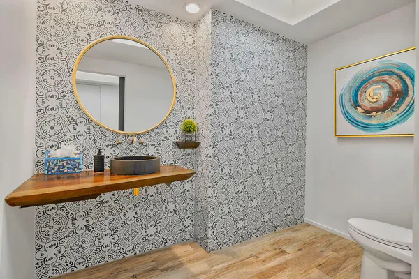 a bathroom with a toilet and a sink