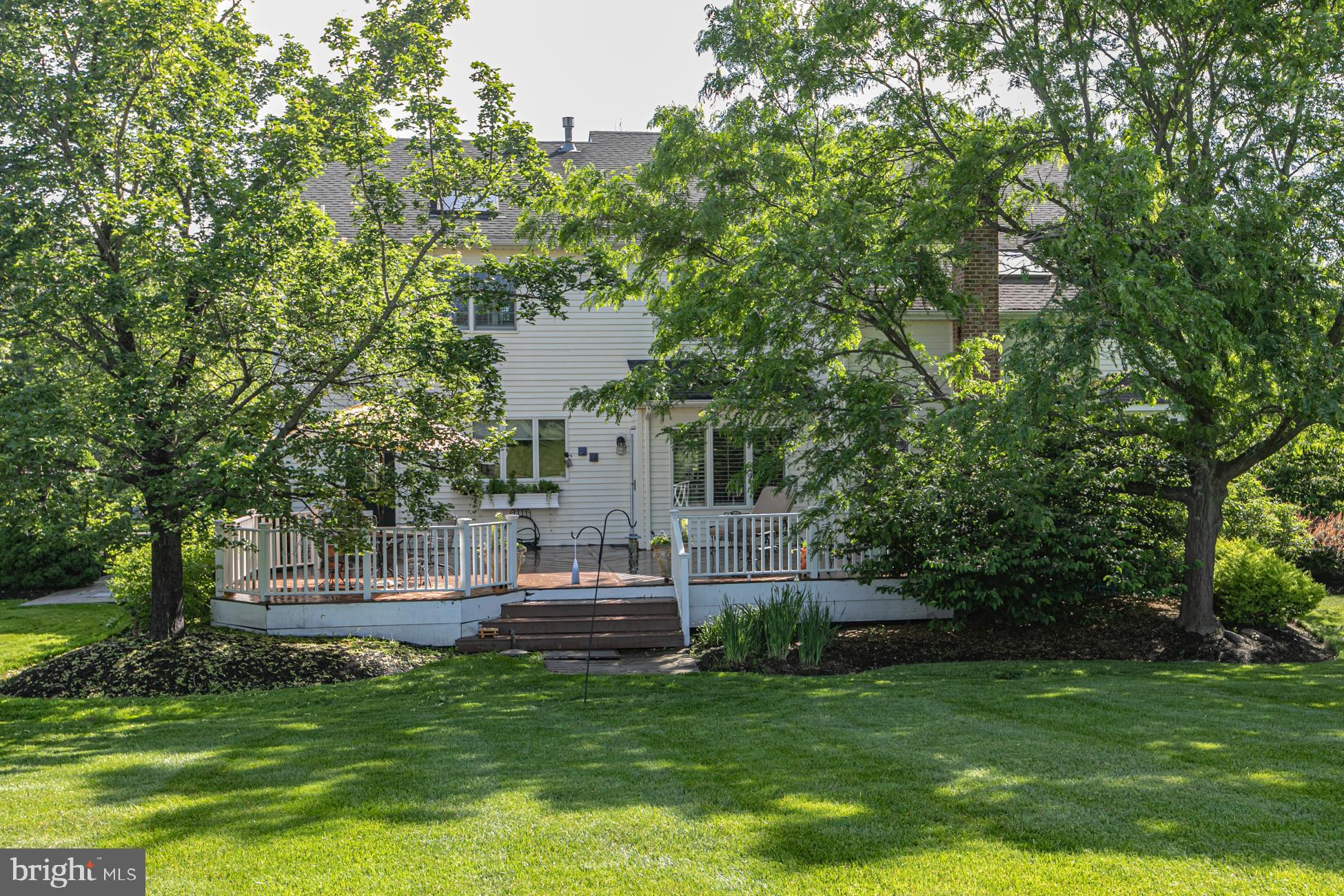 173 Christopher Drive Princeton, NJ 08540 - Photo 9 of 51 From the backyard of the home's back exterior