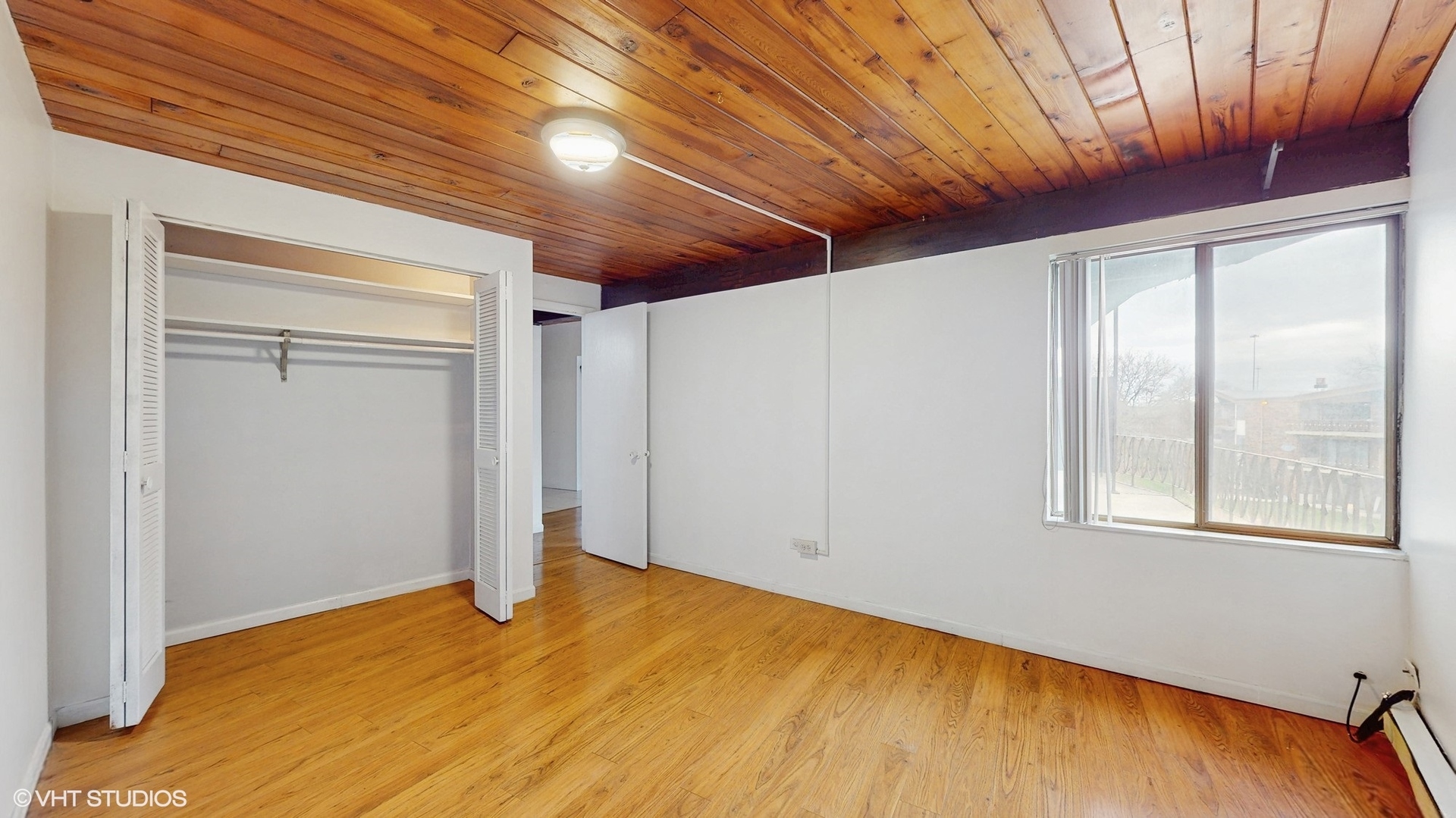 2306 Holiday Terrace, Unit 166 Lansing, IL 60438 - Photo 8 of 13 a view of empty room with wooden floor