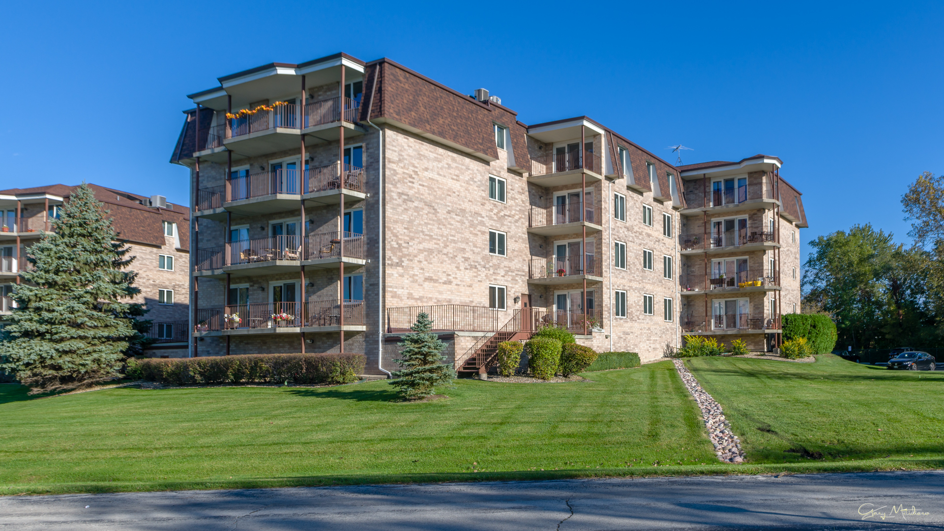 3680 186th Street, Unit 303 Lansing, IL 60438 - Photo 1 of 23 a front view of a building