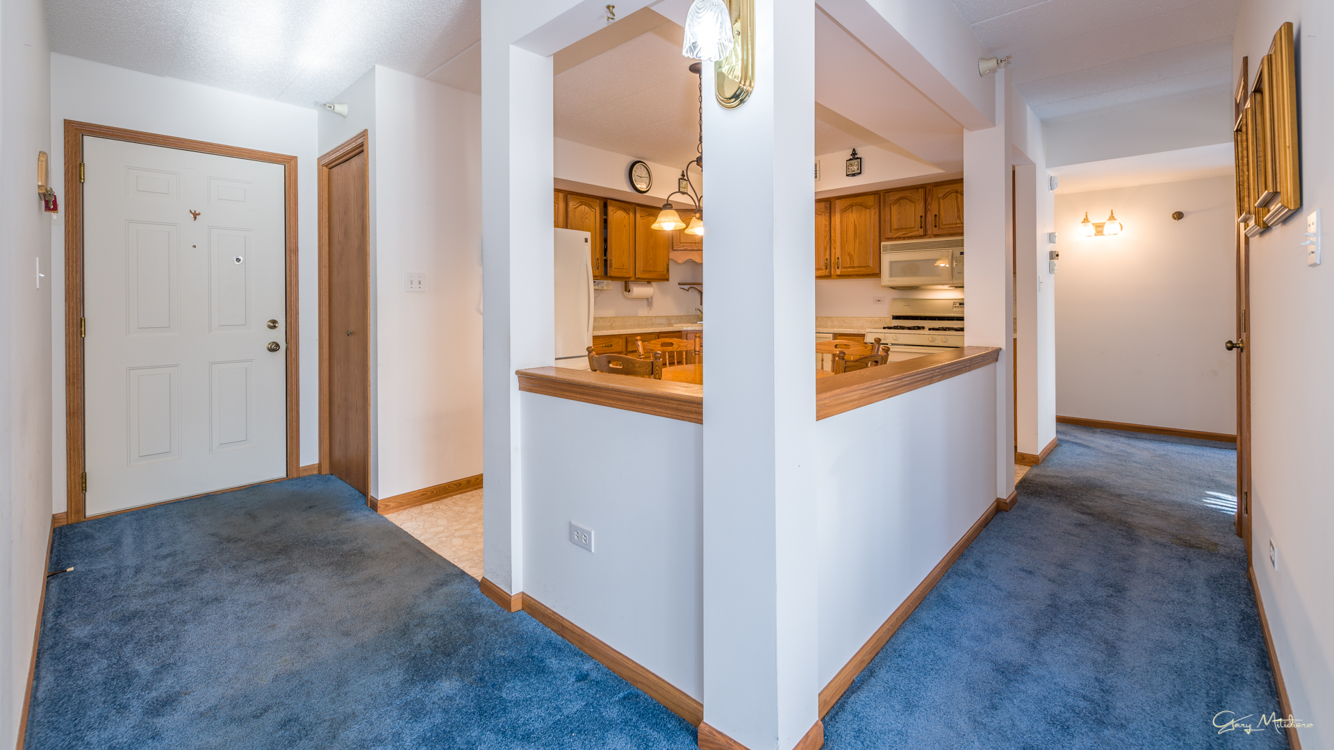 3680 186th Street, Unit 303 Lansing, IL 60438 - Photo 2 of 23 a view of a hallway with wooden floor