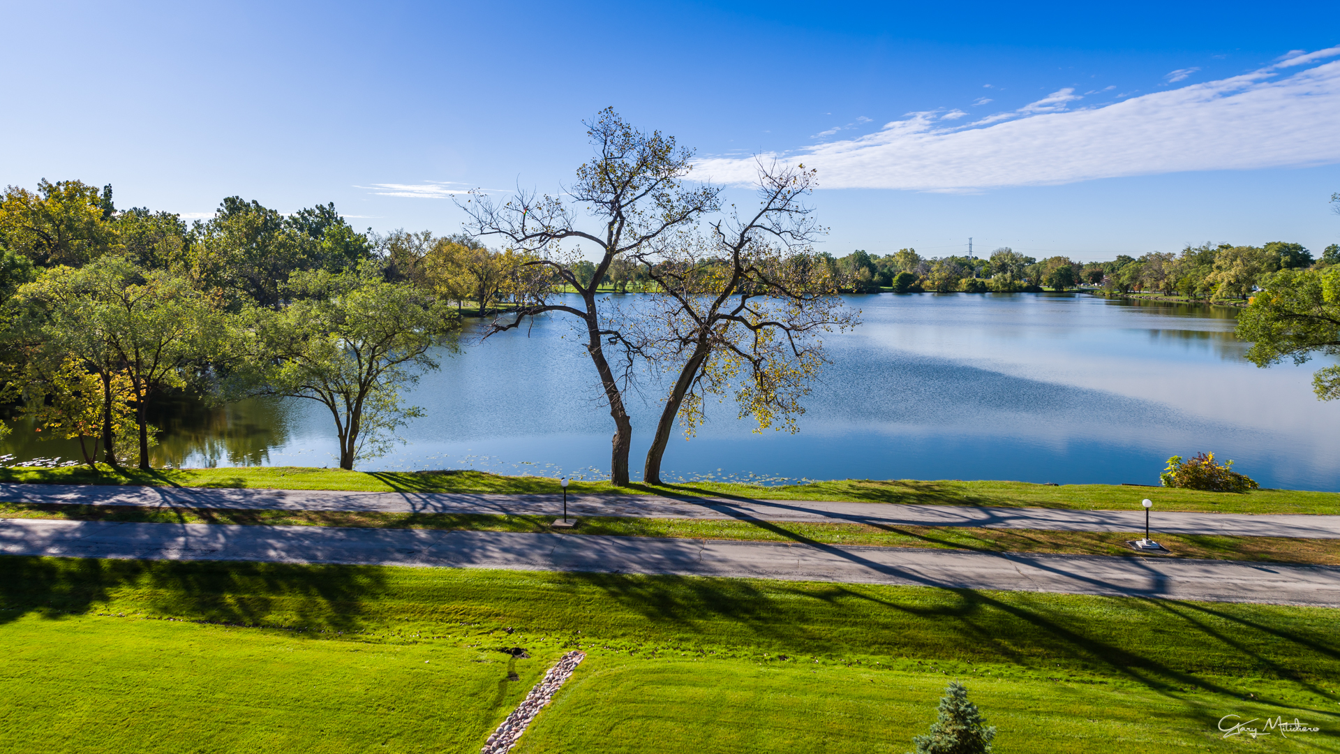 3680 186th Street, Unit 303 Lansing, IL 60438 - Photo 19 of 23 a view of a lake with houses
