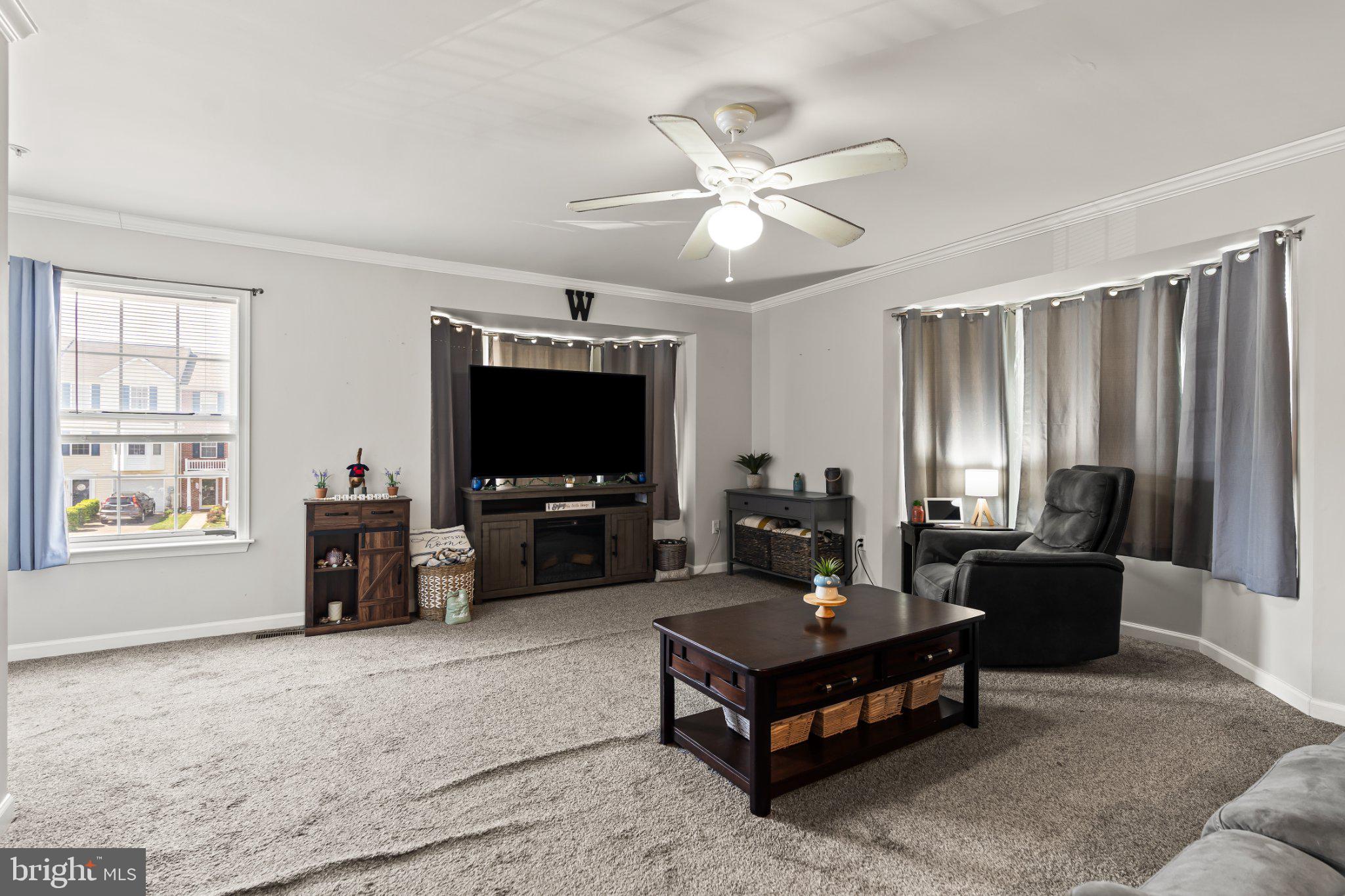 128 Sentry Ridge Smithsburg, MD 21783 - Photo 10 of 41 a living room with furniture and a flat screen tv