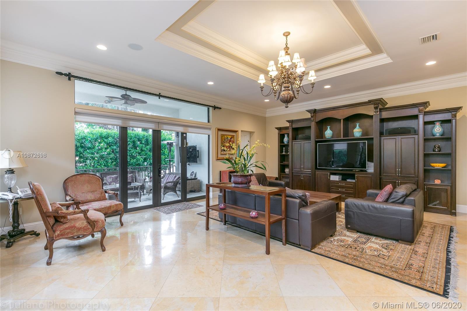 19141 North Bay Road Sunny Isles Beach, FL 33160 - Photo 11 of 42 a living room with furniture and a large window