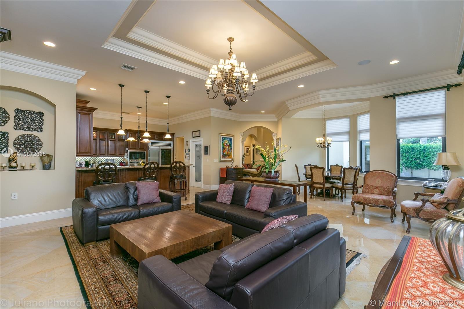 19141 North Bay Road Sunny Isles Beach, FL 33160 - Photo 12 of 42 a living room with furniture and a chandelier