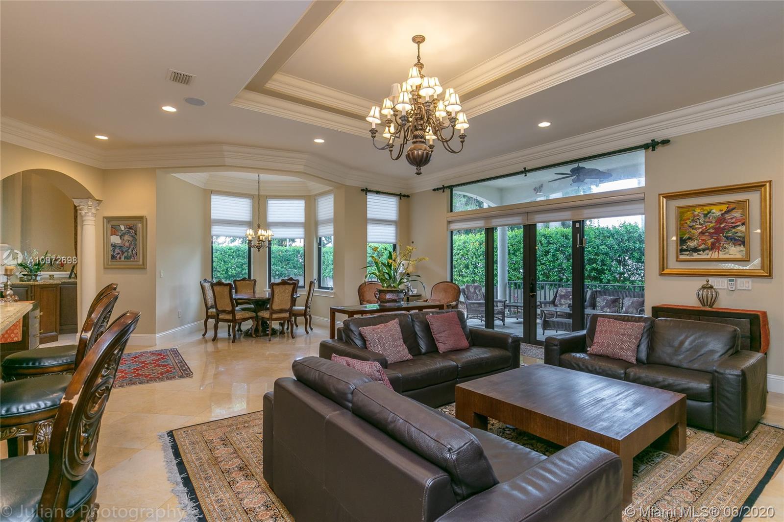 19141 North Bay Road Sunny Isles Beach, FL 33160 - Photo 13 of 42 a living room with furniture and a chandelier