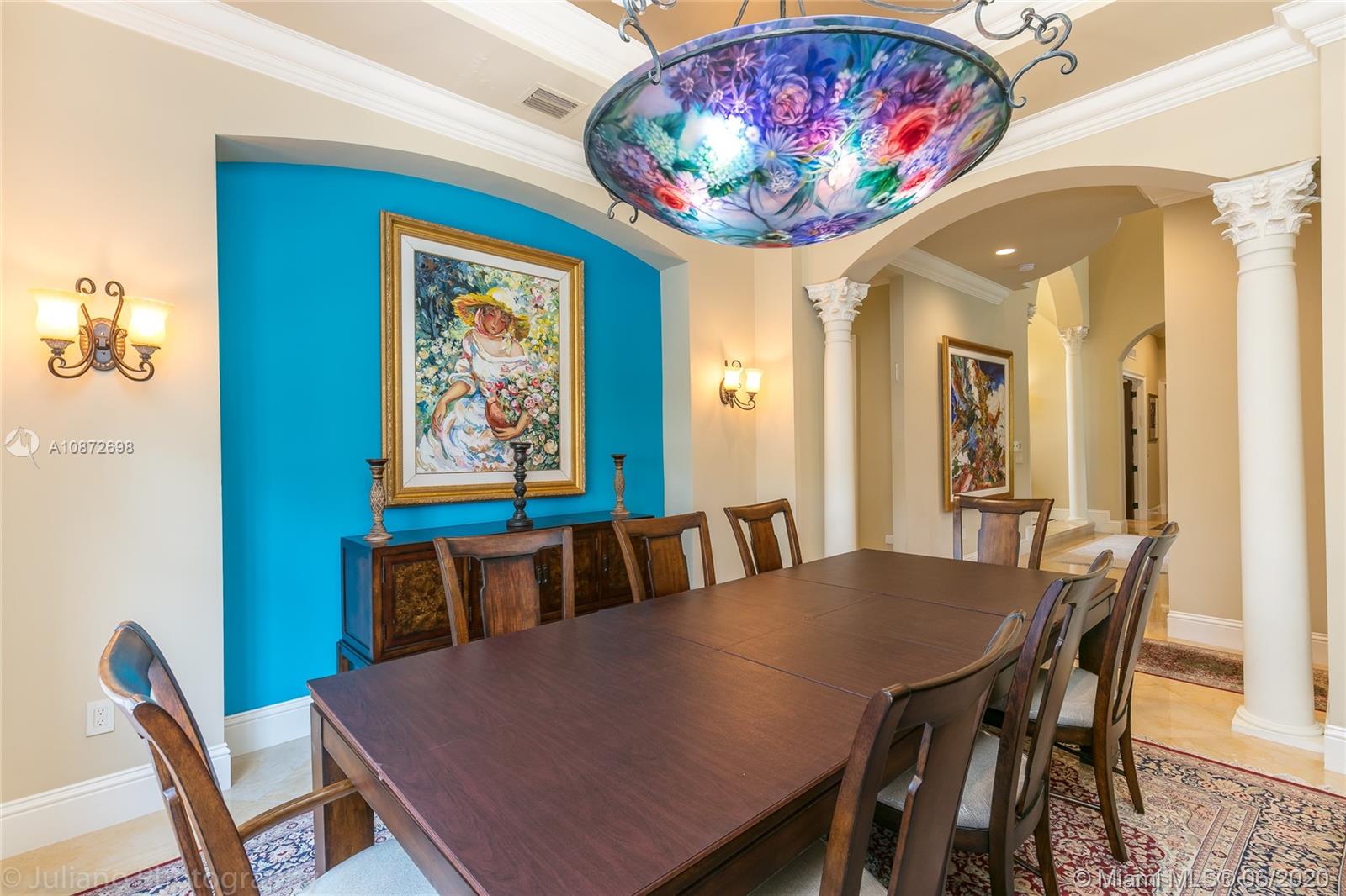 19141 North Bay Road Sunny Isles Beach, FL 33160 - Photo 17 of 42 a view of a dining room with furniture