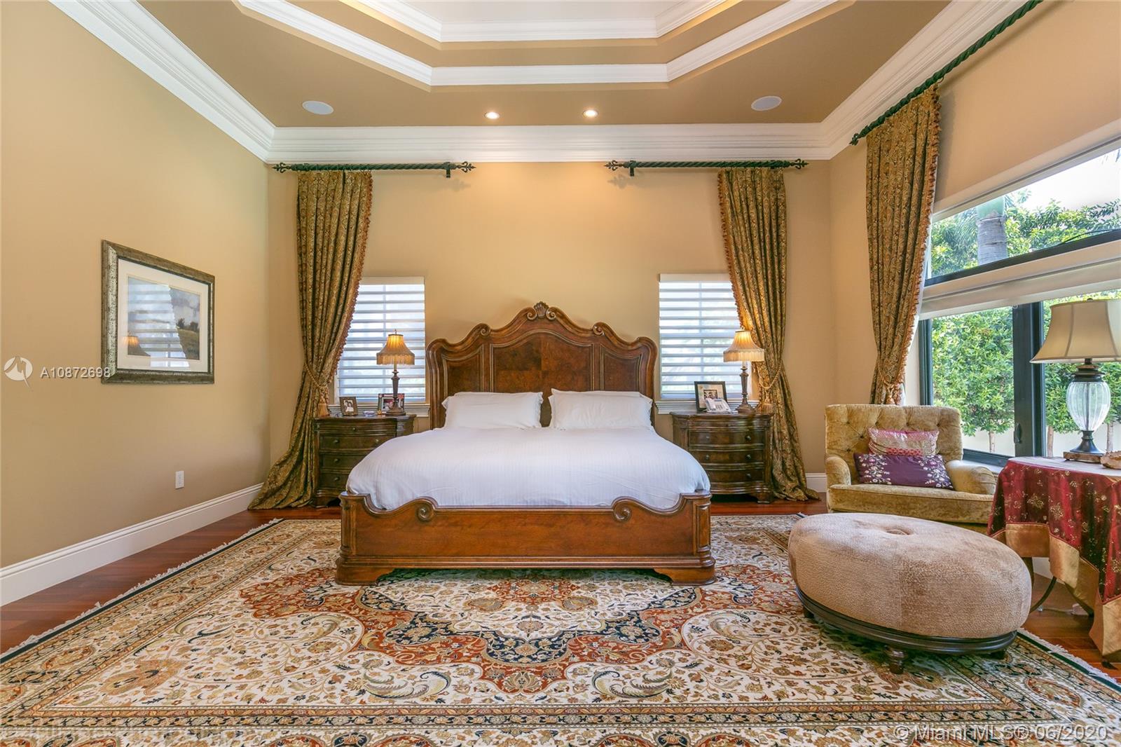 19141 North Bay Road Sunny Isles Beach, FL 33160 - Photo 20 of 42 a bedroom with a large bed and a large window