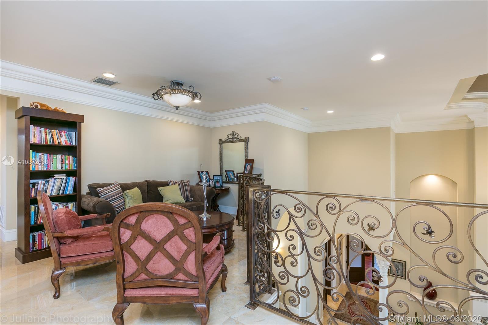 19141 North Bay Road Sunny Isles Beach, FL 33160 - Photo 25 of 42 a living room with furniture and painting on the wall