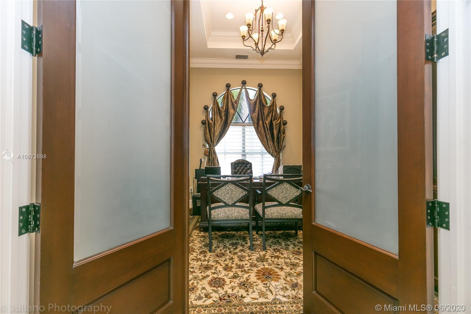 19141 North Bay Road Sunny Isles Beach, FL 33160 - Photo 26 of 42 a view of a living room with a table and chair