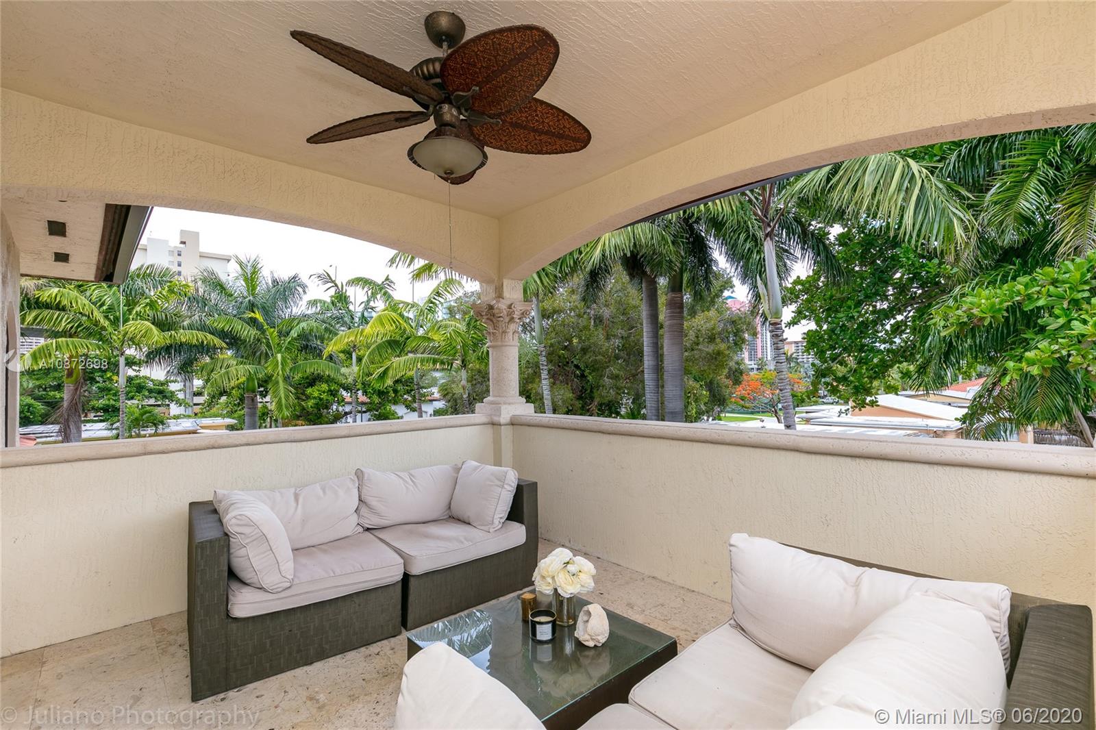 19141 North Bay Road Sunny Isles Beach, FL 33160 - Photo 29 of 42 a living room with furniture and a large window