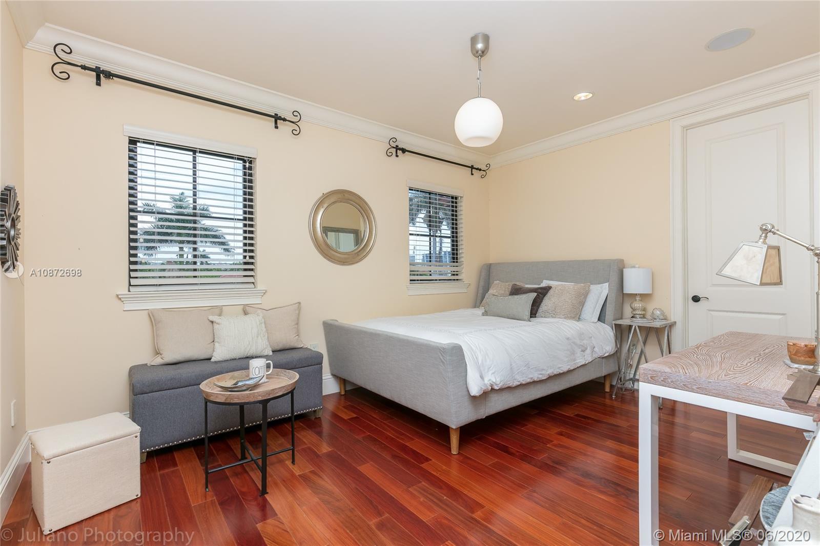 19141 North Bay Road Sunny Isles Beach, FL 33160 - Photo 31 of 42 a living room with a bed furniture and a window