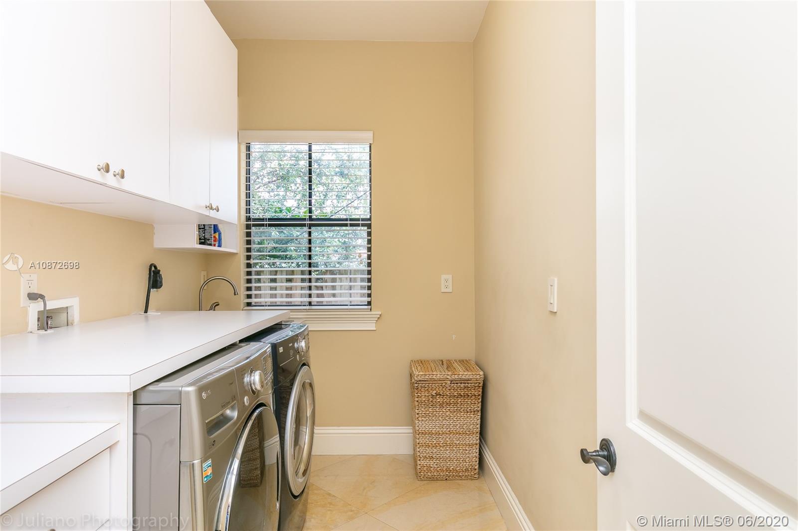19141 North Bay Road Sunny Isles Beach, FL 33160 - Photo 34 of 42 a room with a sink and a window