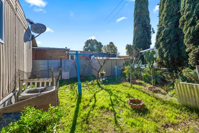 a view of swimming pool with a patio