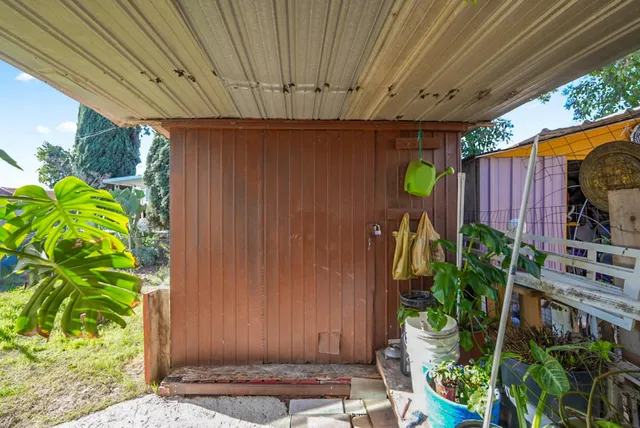 a view of a backyard with plants