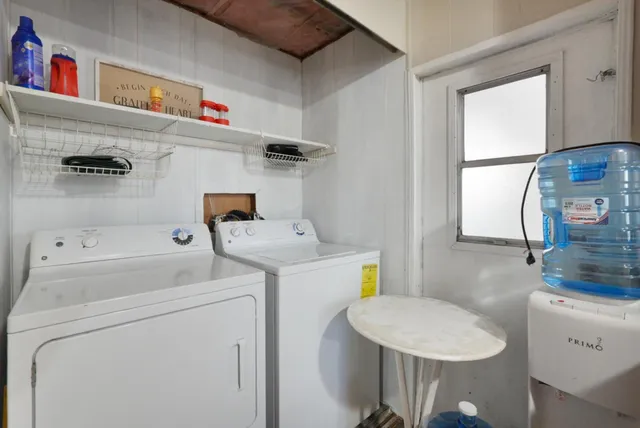 a utility room with dryer and washer