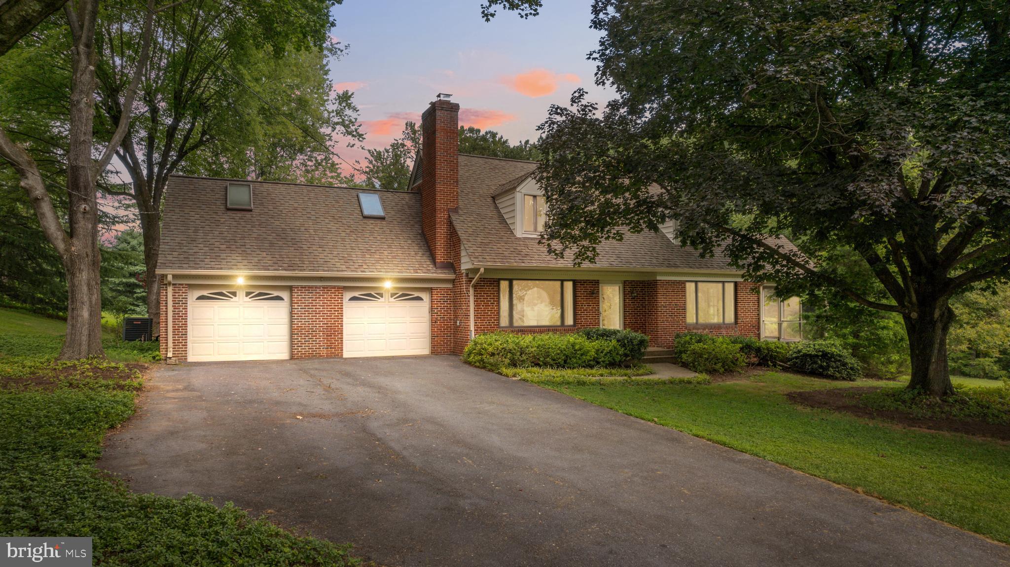 14612 Fairacres Road Silver Spring, MD 20905 - Photo 1 of 53 a front view of a house with a yard and trees