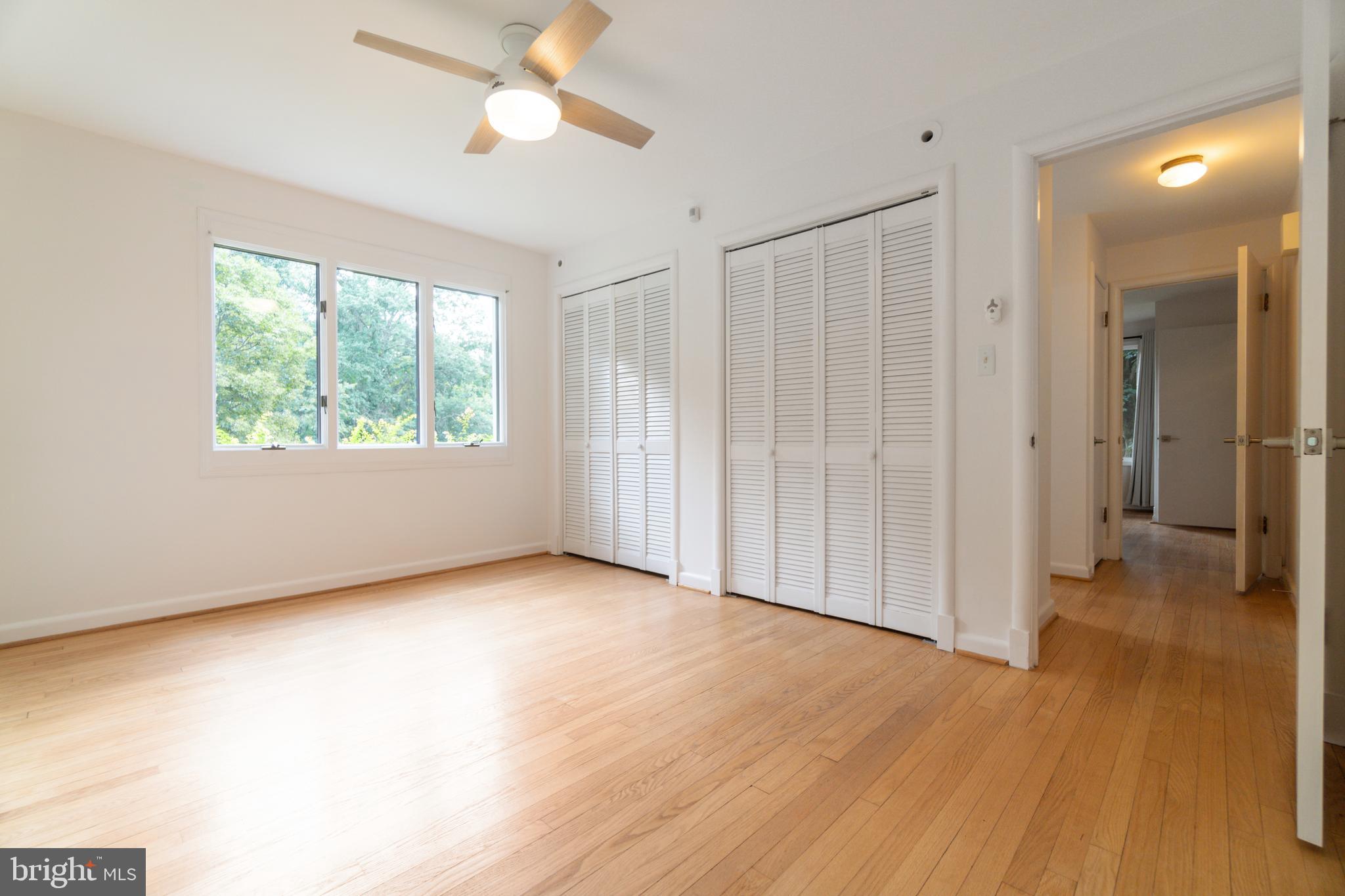 14612 Fairacres Road Silver Spring, MD 20905 - Photo 14 of 53 wooden floor in an empty room with a window