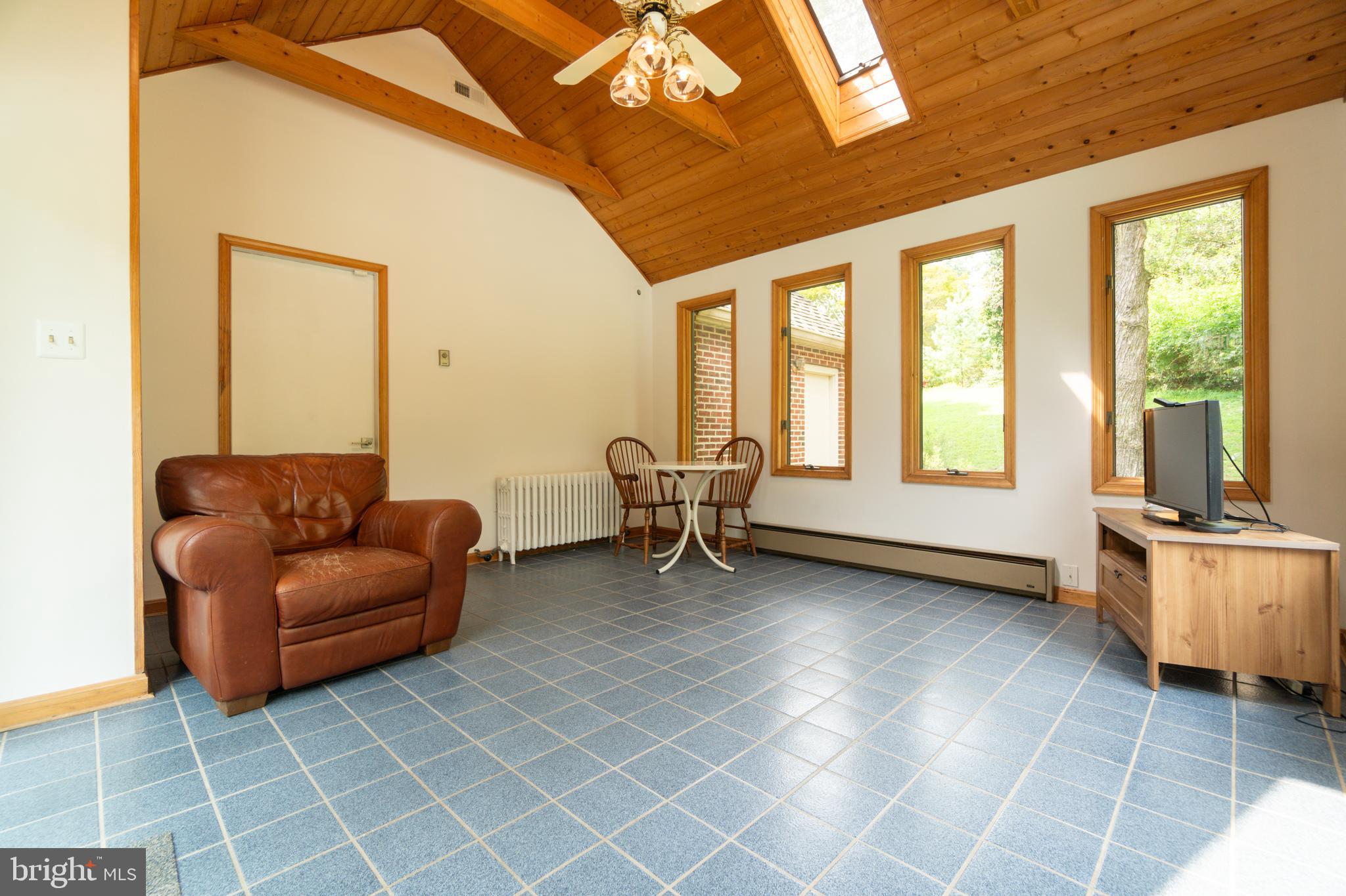 14612 Fairacres Road Silver Spring, MD 20905 - Photo 16 of 53 a living room with furniture and a window
