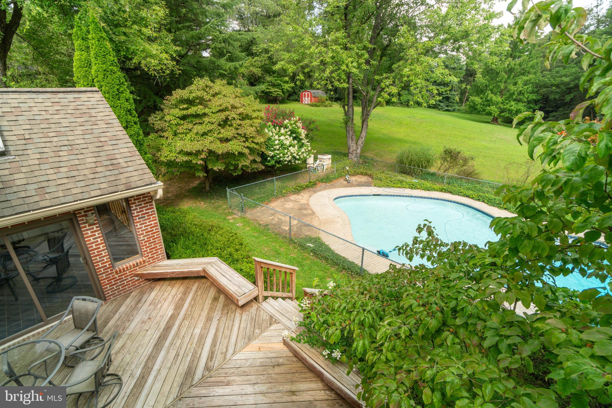 14612 Fairacres Road Silver Spring, MD 20905 - Photo 23 of 53 a view of a swimming pool with a patio
