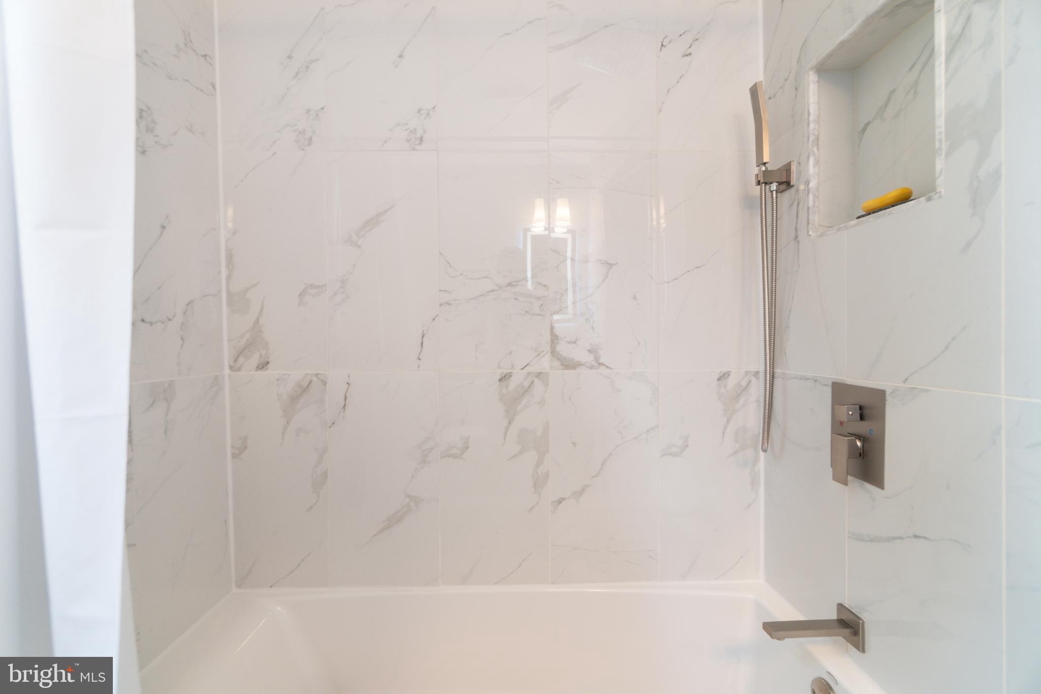 14612 Fairacres Road Silver Spring, MD 20905 - Photo 26 of 53 a bathroom with a bathtub