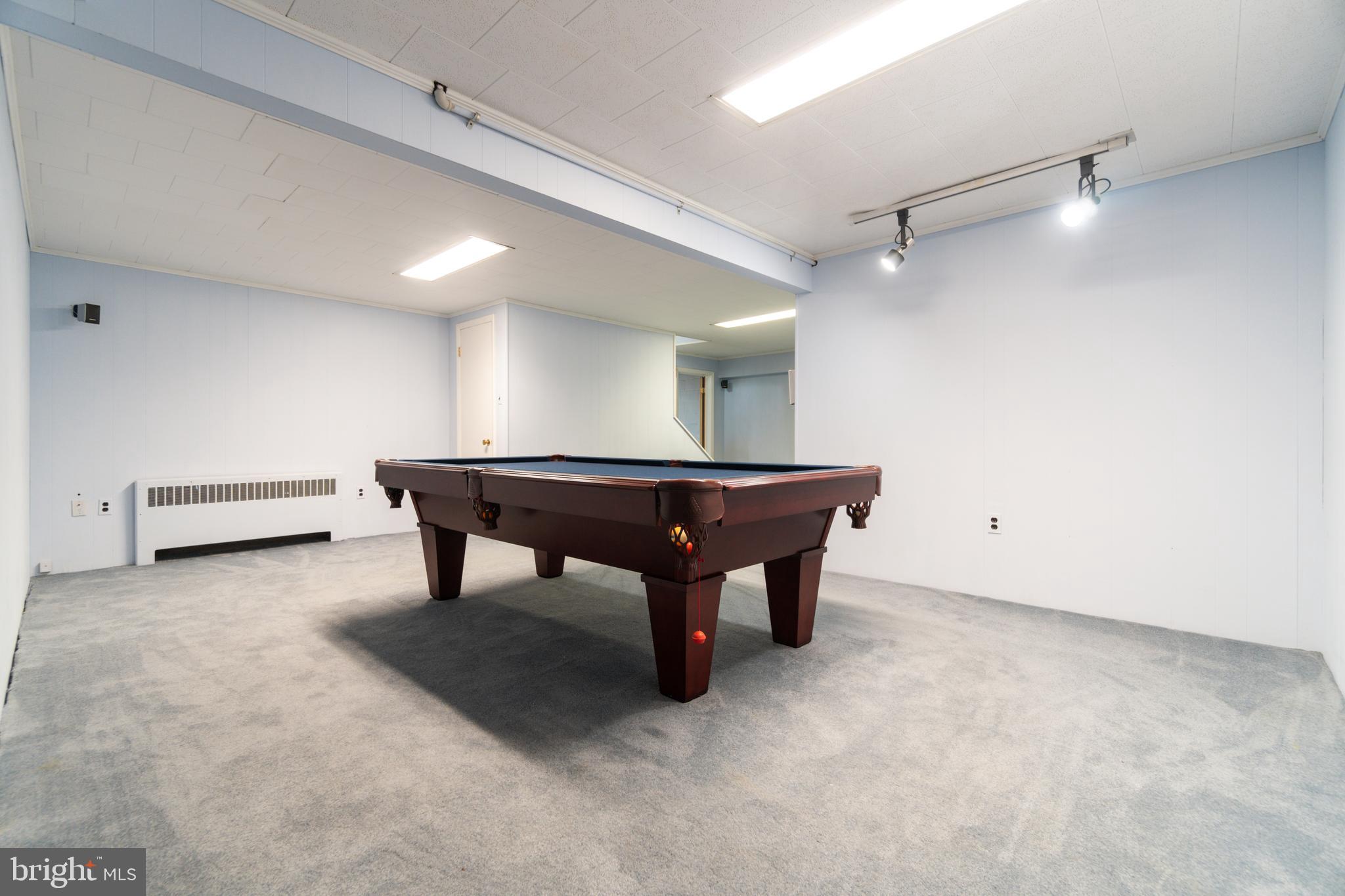 14612 Fairacres Road Silver Spring, MD 20905 - Photo 29 of 53 a room with furniture and white walls