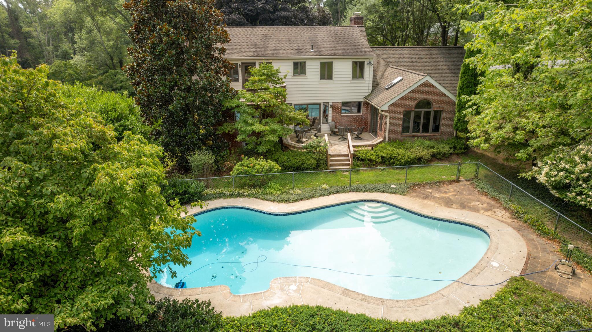 14612 Fairacres Road Silver Spring, MD 20905 - Photo 37 of 53 a view of a house with a yard and sitting area
