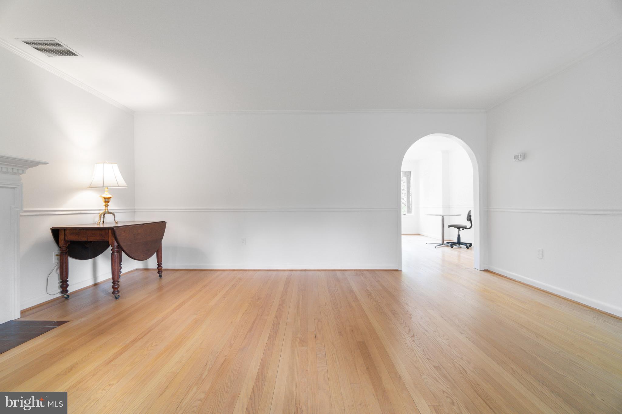 14612 Fairacres Road Silver Spring, MD 20905 - Photo 5 of 53 a view of a room with wooden floor table and chairs