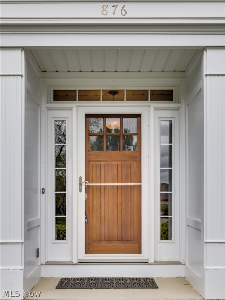 876 Hunter Ridge Circle Fairlawn, OH 44333 - Photo 2 of 35 Custom wood front door at the covered entryway