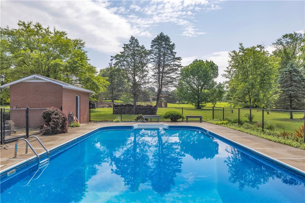 206 Brook Hollow Road Mount Pleasant, PA 15666 - Photo 14 of 41 a view of a house with swimming pool and sitting area