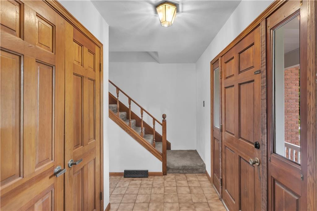 206 Brook Hollow Road Mount Pleasant, PA 15666 - Photo 16 of 41 a view of an entryway with staircase