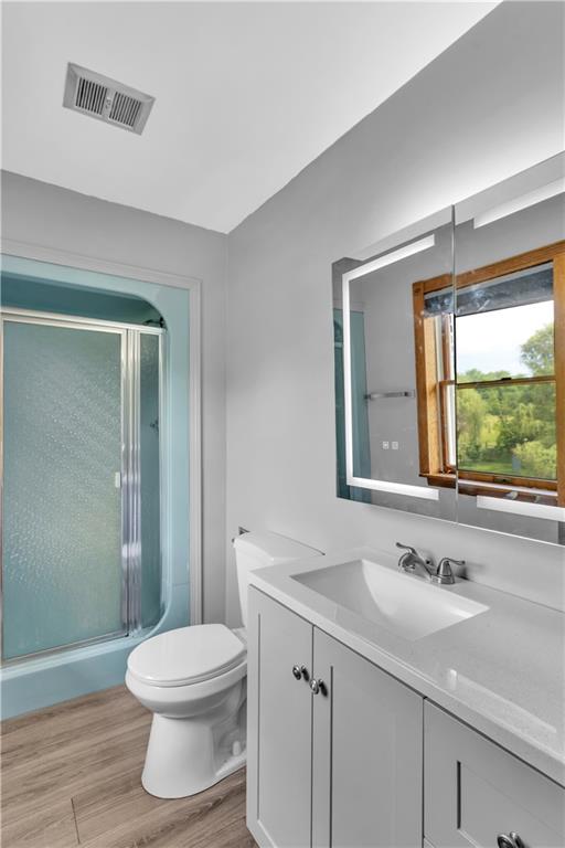 206 Brook Hollow Road Mount Pleasant, PA 15666 - Photo 36 of 41 a bathroom with a sink a toilet and shower