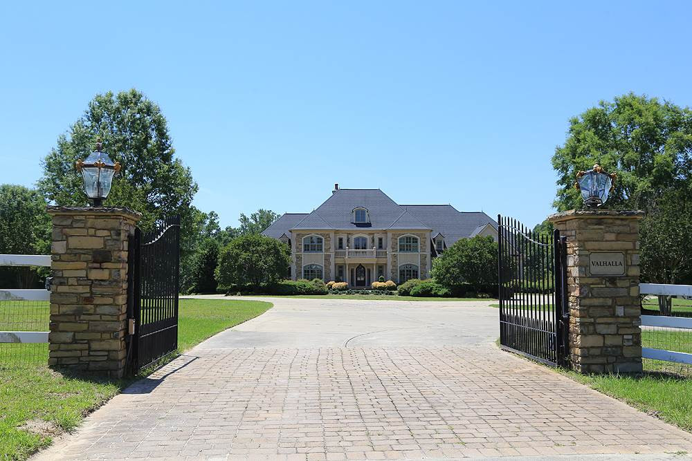 915 Ennis Road Angier, NC 27501 - Photo 2 of 30 Tree lined drive takes you to 915 & 917 Ennis Rd Equestrian Estate Gated Entry