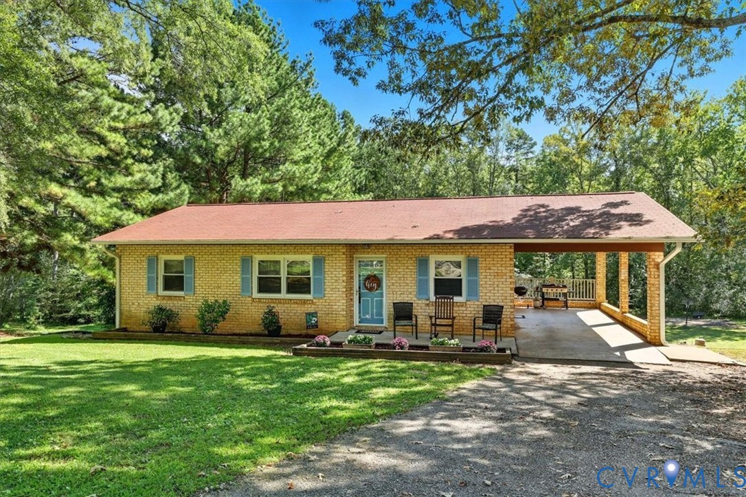 237 Craddock Street Boydton, VA 23917 - Photo 1 of 41 Single story home with a front yard, a carport, gr